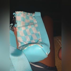 The color is blue and white and it is a kid bag an women bag.